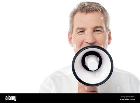 Mature Man Proclaiming Into Megaphone Advertising Stock Photo Alamy