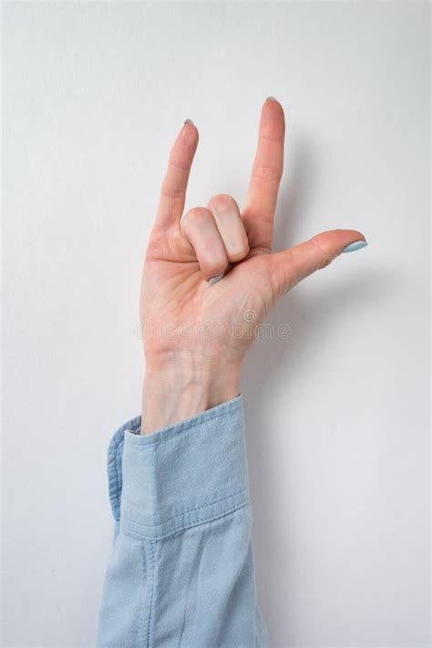 Rock On Hand Gesture Female Hand Showing Two Fingers Stock Image