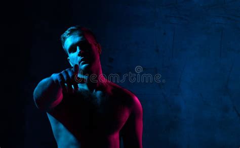 Neon Light Portrait Of Man Muscular Body Naked Pointing Hands Finger