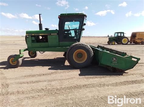 1985 John Deere 3830 Swather Bigiron Auctions