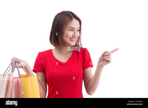 Shopping Woman Smiling Joyful And Happy Holding Shopping Bags Pointing