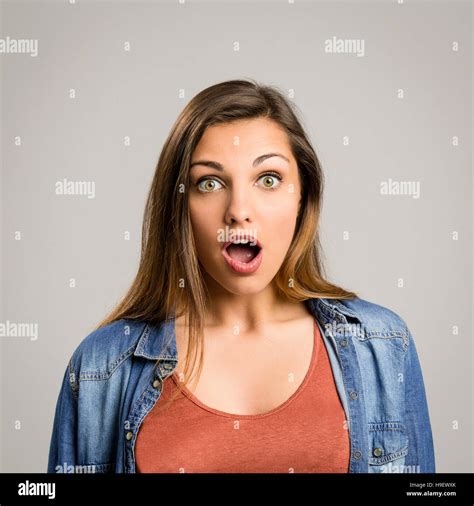 Portrait of a beautiful woman with a surprised face Stock Photo - Alamy