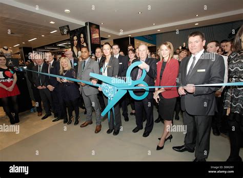 Primark Management Cutting The Ribbon At The Opening Day Of The New