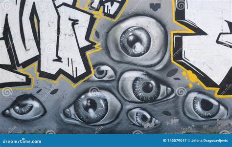 Graffiti Art in the City Street Showing Many Painted Eyes on the Concrete Gray Wall As ...