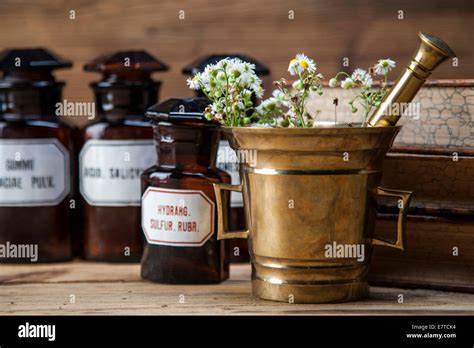 The Ancient Natural Medicine Herbs Medicines And Old Book Stock Photo