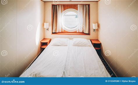 Ship Cabin With Bed And Window With View On Sea Luxury Cabin On Ferry