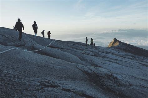 Mountaineer Climbing Ice Wall · Free Stock Photo