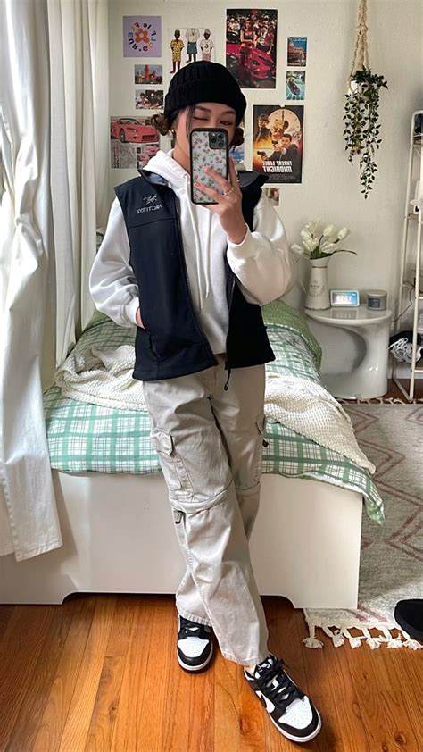 Outfit With Black Arcteryx Vest White Hoodie Cargo Pants Black White