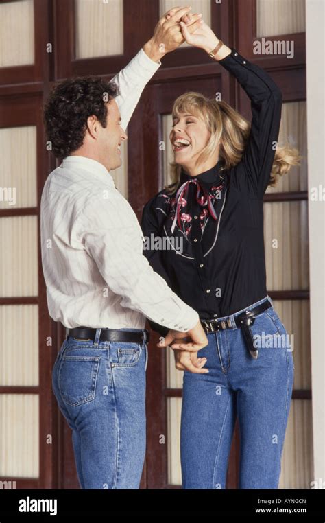 Romantic couple dancing together, country western style, Miami Stock Photo - Alamy