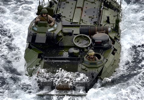 A Marine Corps Amphibious Assault Vehicle Enters The Well Deck Of The Amphibious Assault Ship