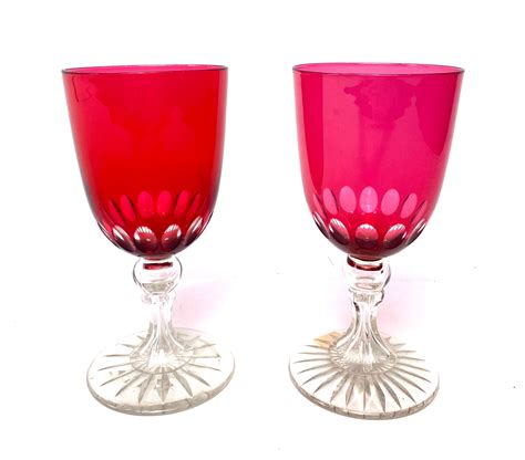 Lot A Pair Of Victorian Cranberry Glass Wine Goblets