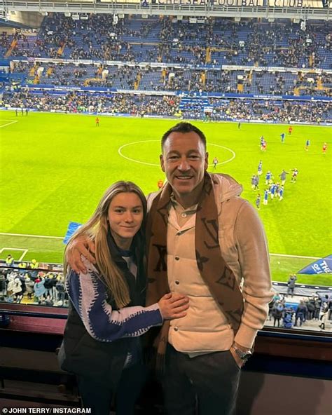 John Terry and wife Toni pose with their lookalike twin son and ...