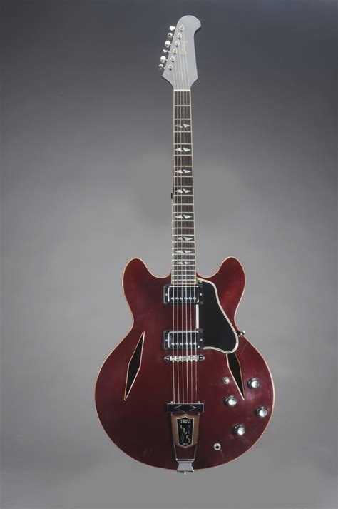 GIBSON INCORPORATED , A HOLLOW-BODY ELECTRIC GUITAR, TRINI LOPEZ ...