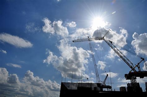 Premium Photo Low Angle View Of Silhouette Cranes Against Sky