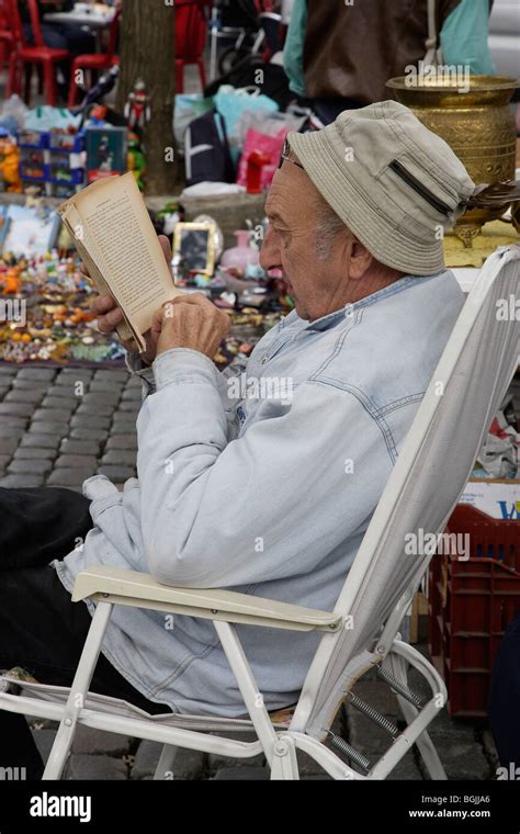 Elderly Man Reading Book Stock Photo Alamy