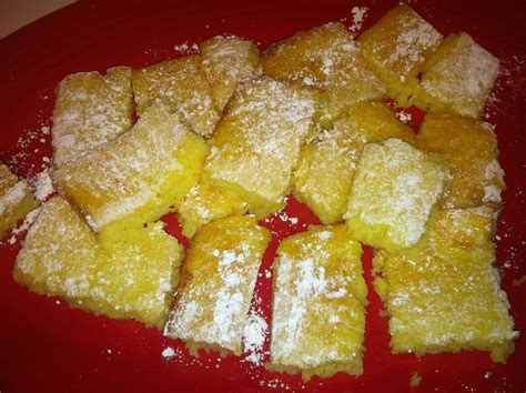 Angel food lemon bars! Mix a box of angel food cake mix and 2 cans of lemon pie filling (th ...