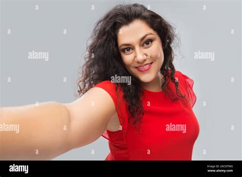 Beautiful hispanic woman taking hi-res stock photography and images - Alamy