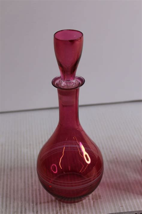 Vintage Red Glass Decanter With 5 Shot Glasses Bodnarus Auctioneering