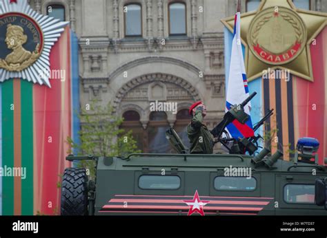 A Russian Soldier In A T 14 Armata Battle Tank Marches Along The Red