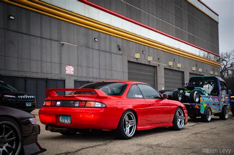 Red Nissan 240sx On Three Spoke Wheels