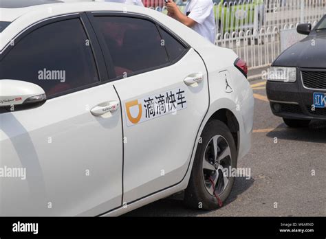 Un Logotipo De Chinos Procedentes De Taxi Y Auto Servicio App Didi