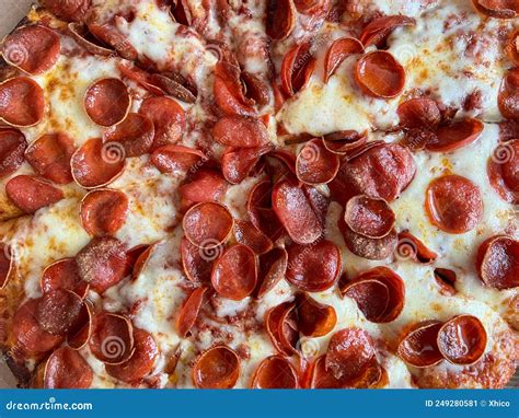 A Whole Large Pepperoni Pizza With Mini Pepperonis Stock Photo