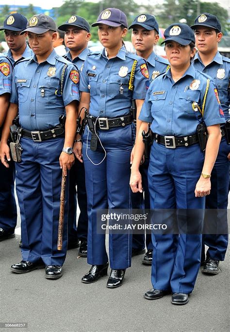 Philippines National Police In Uniform Stands At Attention In Manila