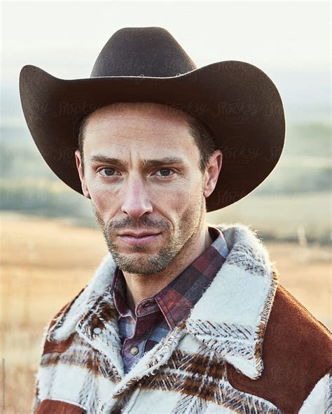 Cowboy Portrait In A Field By Stocksy Contributor Shaun Robinson