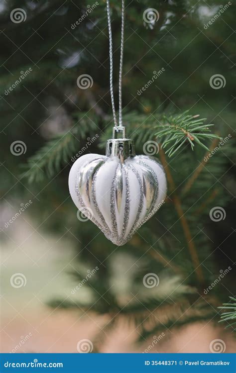 Heart Shaped Christmas Bauble On Tree Stock Image Image Of Ornament