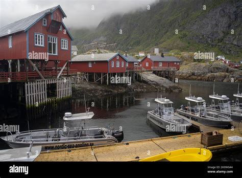 Red Fishermen Cabin In A Fishing Village Of Lofoten Islands Norway