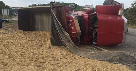 Dump Truck Rolls Over Spills Sand On I 495 Cbs Boston