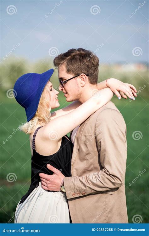 Young Women Put Her Hands On The Shoulders Of Men Stock Image Image