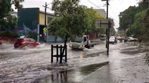 Sydney floods: One dead as month's worth of rain falls in single ...