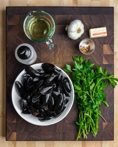 Mussels in White Wine Sauce - Sip and Feast