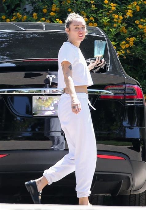 Miley Cyrus Wearing Sweat Pants And A White Crop Top Malibu 0805