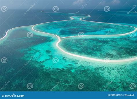 Aerial View of an Atoll with an Underwater Coral Reef Seen through Clear Blue Sea Water Stock ...