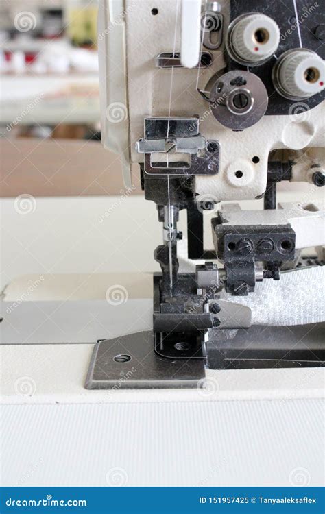 Professional Sewing Machine Overlock In The Workshop Equipment For