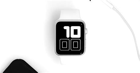 Black and White Smart Watch on White Surface · Free Stock Photo