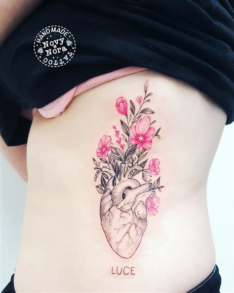 Discover more than 63 anatomical heart tattoo with flowers - in.cdgdbentre