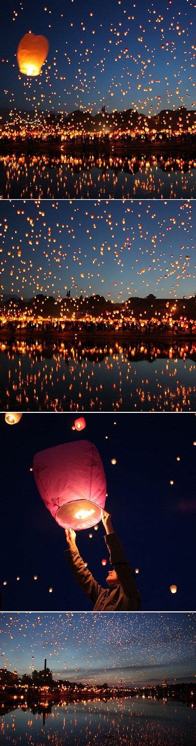 The Sky Is Filled With Lots Of Bright Lights And Floating Lanterns In