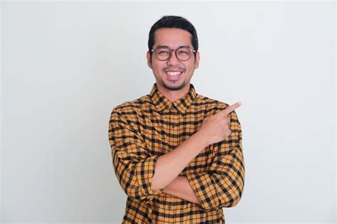 Premium Photo Adult Asian Man Smiling Happy With His Right Hand