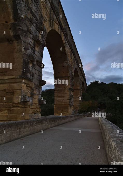 Beautiful view of ancient Roman aqueduct Pont du Gard in the evening ...