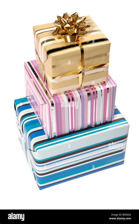 Three Gift Wrapped Parcels Stock Photo Alamy