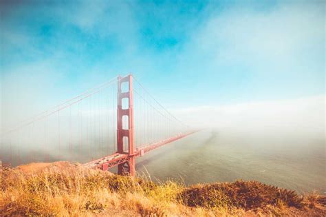 Colorful Golden Gate Bridge in Foggy But Sunny Weather | Free Car Photo ...