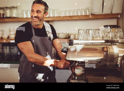 Man Preparing Espresso Machine Hi Res Stock Photography And Images Alamy