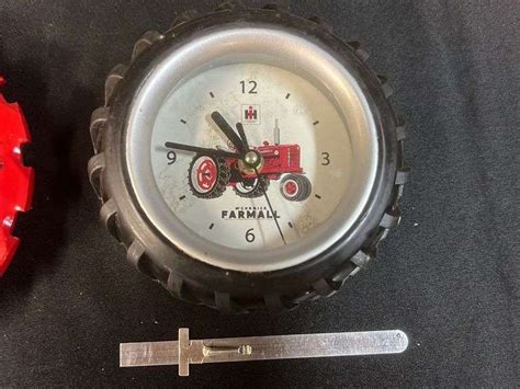 Two Battery Operated Clocks - Aumann Auctions, Inc.