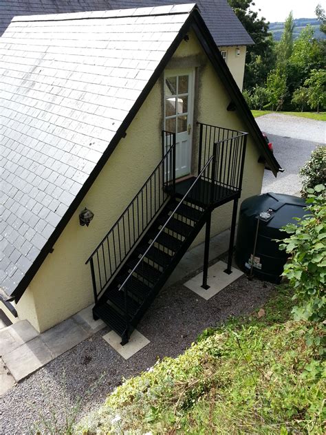 External metal staircase to a garage loft conversion | Exterior stairs ...