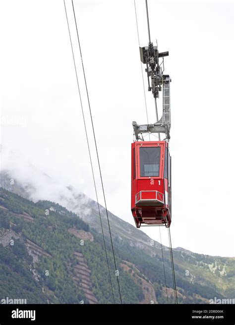 Cable car in the Switzerland, red cable car Stock Photo - Alamy