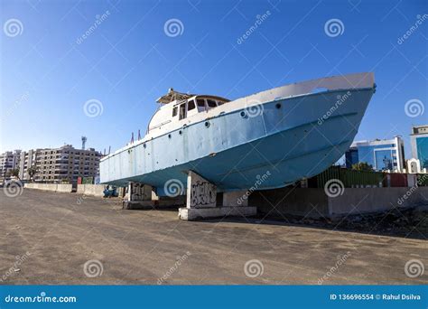 Old Abandoned Wrecked Speed Boat At Ship Or Boat Graveyard Lots Of