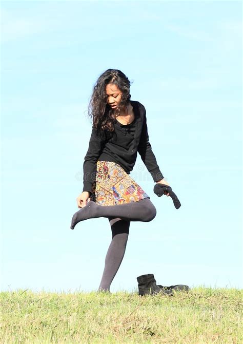 Kid Girl Putting On Shoes On Swing Stock Image Image Of Dressing